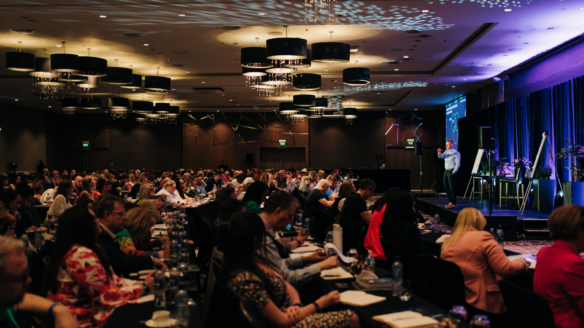 Speaker presenting on the Expert Empires stage